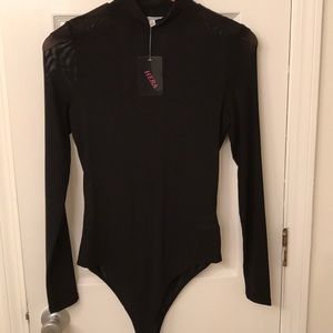 Long sleeved body suit